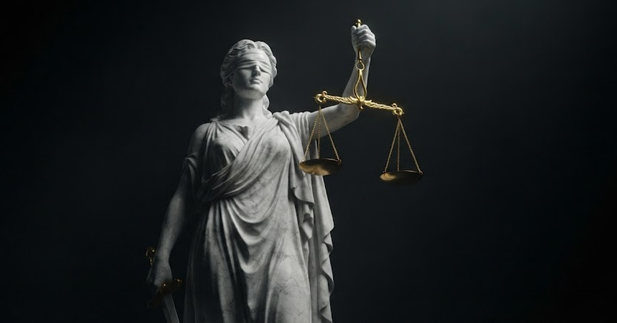A colossal marble figure of Themis raising golden scales held in exact balance against a black void.