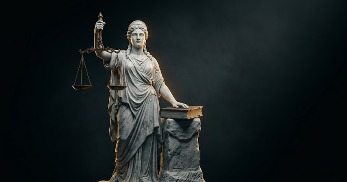 Themis, marble goddess of justice, holding scales over a carved ledger, gold rim light raking across white stone in deep shadow