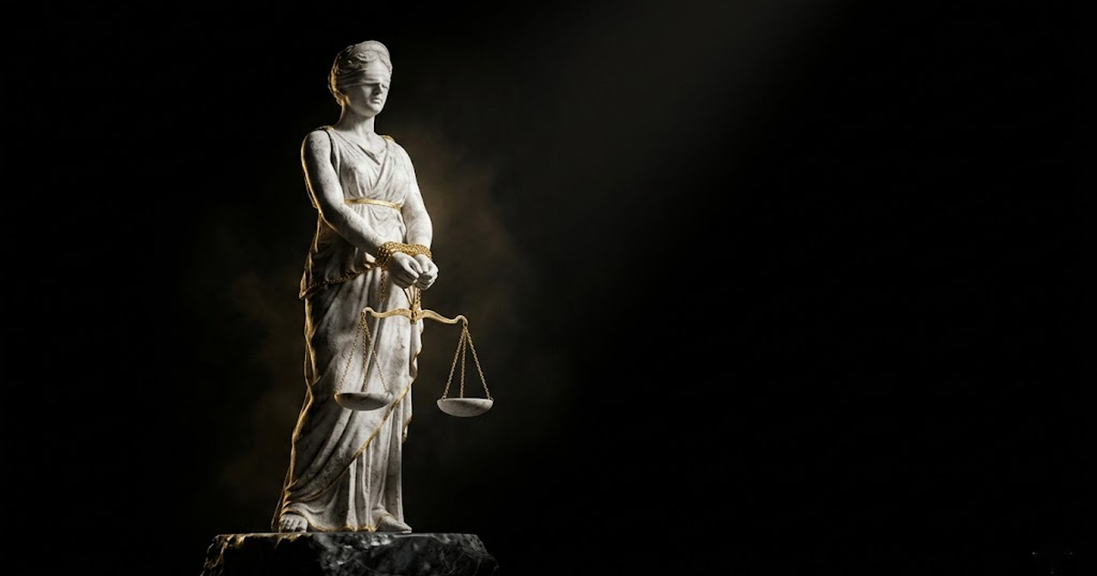 A marble statue of blindfolded Themis holding empty scales, her hands bound by a thin gold chain against a void black background