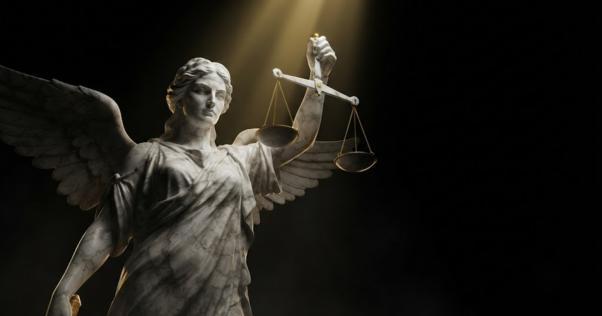 A colossal marble figure of Nemesis standing in darkness holding a set of balanced scales, lit by gold light