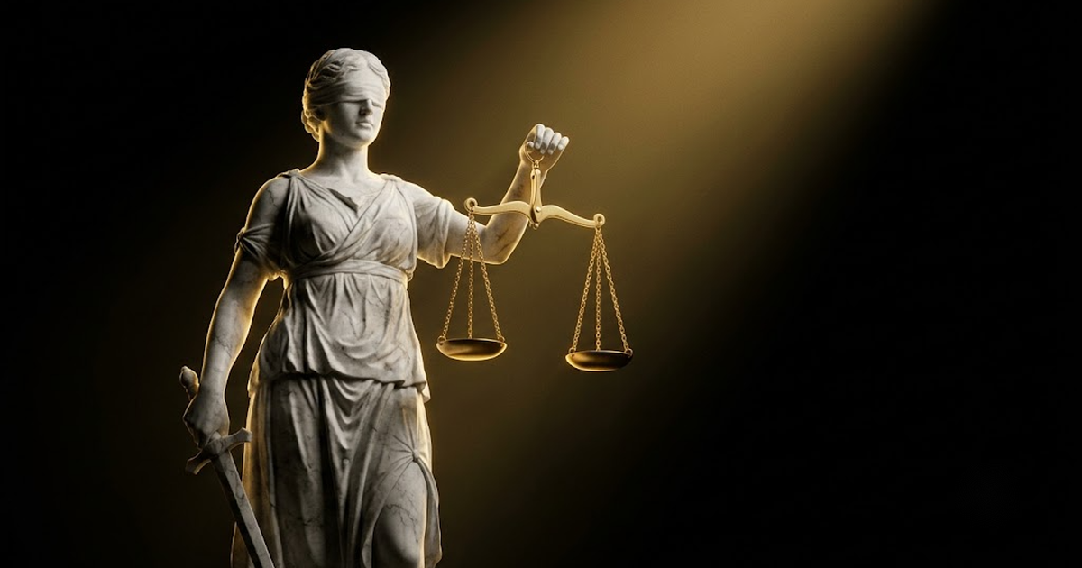 A colossal marble Themis standing with scales held level lit by gold light against a void black field