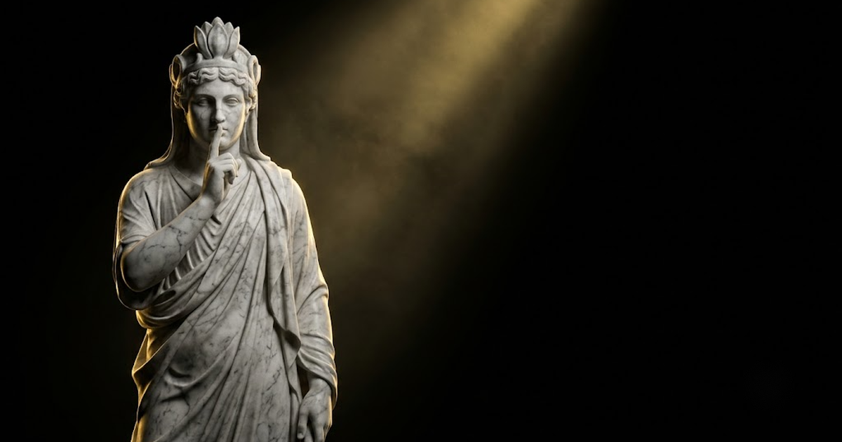 A colossal marble figure of Harpocrates pressing a finger to his lips in gold-lit silence against a black background